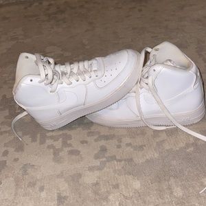 High top white Nikes youth